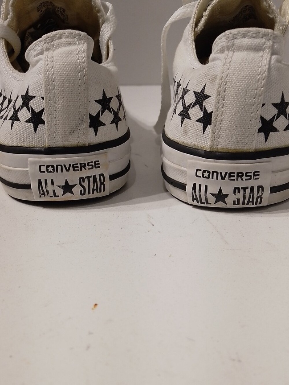 Converse White Low Top Sneakers with Black Star Pattern - Picture 3 of 6